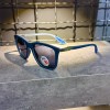 عینک برند RAY BAN فریم سرمه ای / شیشه دودی کد RB7222